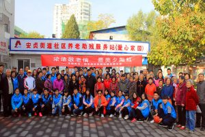 Longzhen Group Photo A group photo of people in blue jackets.